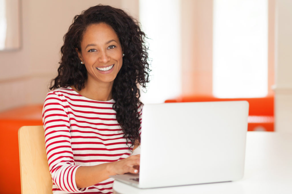 African-American-Woman-Working-on-a-laptop